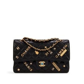 Black Quilted Embellished Bag by Chanel at Chanel