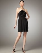 Black halter dress with ruffles at Last Call