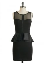 Black peplum dress with sheer panels at Modcloth