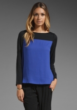 Blue and black colorblock sweater at Revolve