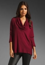 Burgundy cowl neck top at Revolve