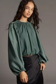 By Anthropologie Cropped Puff Sleeve Bubble Hem Blouse at Anthropologie