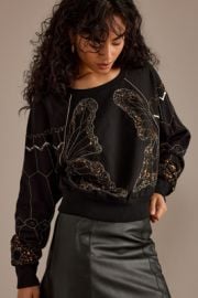 By Anthropologie Sequin Butterfly Cotton Sweatshirt at Anthropologie