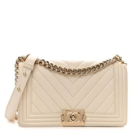 CHANEL Caviar Chevron Quilted Medium Boy Flap Ivory 1299209 FASHIONPHILE at Fashionphile