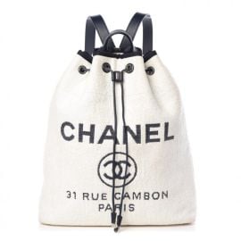 CHANEL Woven Straw Raffia Large Deauville Backpack White Navy 391671 FASHIONPHILE at Fashionphile