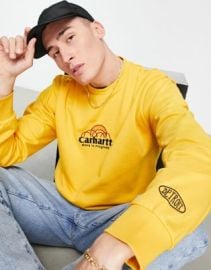 Carhartt WIP geo script sweatshirt in yellow at ASOS