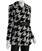 Carries houndstooth coat by Via Spiga at Bluefly