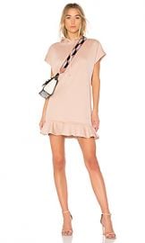 Carven Hoodie Dress With Ruffles in Fond De Teint from Revolve com at Revolve