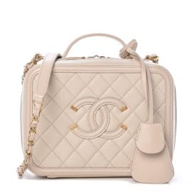 Caviar Quilted Medium CC Filigree Vanity Case Light Beige at Fashionphile