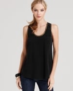 Ceces black and gold top at Bloomingdales at Bloomingdales