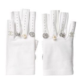 Chanel Lambskin Charms Fingerless Gloves in White at Fashionphile