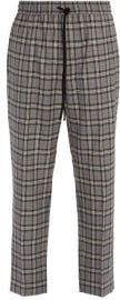 Check wool pants by Gucci at Matches