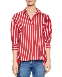 WornOnTV: Morgan’s red and white striped shirt on E! news Daily Pop ...