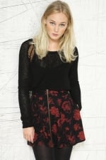 Clara's red and black floral skirt at Urban Outfitters