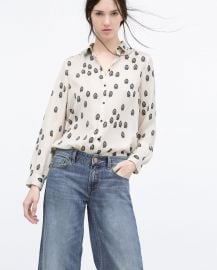 Contrasting printed blouse at Zara