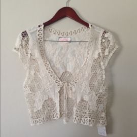 Crochet vest by Free People at Poshmark