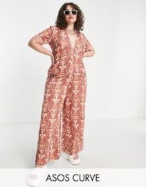 DESIGN Curve twill collar jumpsuit with wide leg in retro swirl print at ASOS