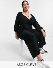 DESIGN curve wrap textured jumpsuit in black at ASOS