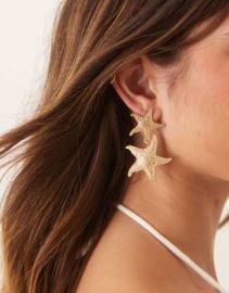 DESIGN drop stud earrings with double starfish design in gold tone at ASOS