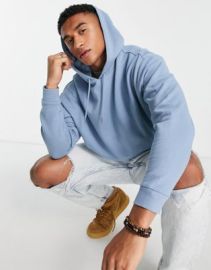 DESIGN oversized hoodie in washed blue at ASOS