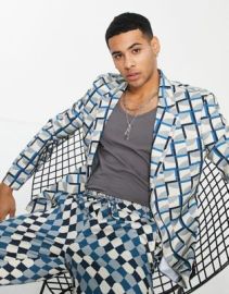 DESIGN slim suit jacket in turquoise geo print at ASOS