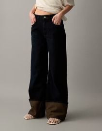 DESIGN wide leg jeans with extreme cuffed hems in indigo with brown tint at ASOS
