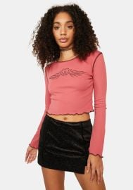 Delias Tattoo Graphic Lettuce Trim Long Sleeve Crop Top at Dolls Kill