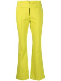 Dorothee Schumacher flared-leg button-detail Trousers - at Farfetch