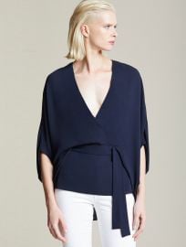 Drape sleeve top at Halston