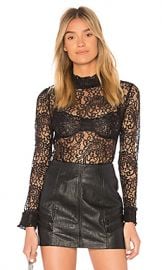 Endless Rose Ruffle Mock Neck Blouse in Black from Revolve com at Revolve