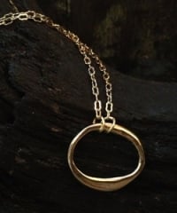 Eternity Puffed Circle Pendant at Kami Lerner