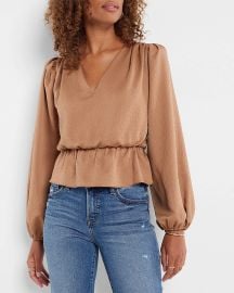 Express Long Sleeve V Neck Peplum Top in Butterscotch at Express