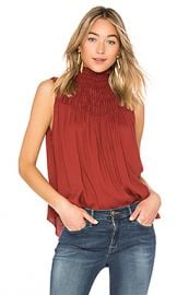 FRAME Smocked Sleeveless Blouse in Burnt Henna from Revolve com at Revolve