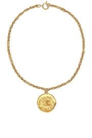 FWRD Renew Chanel Coco Pendant Necklace in Gold FWRD at FWRD
