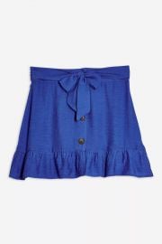 Flippy button mini skirt at Topshop