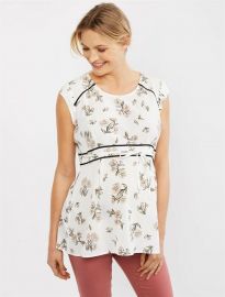 Floral peplum top at Motherhood