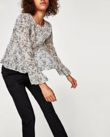 Flowing peplum blouse at Zara