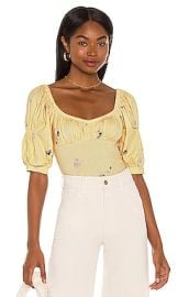 Free People Play Date Bodysuit in Buttercup at Revolve