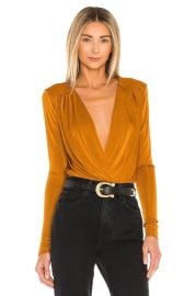 Free People Turnt Bodysuit in Honey Ginger at Revolve