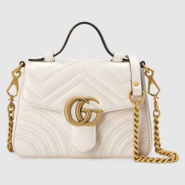 GG Marmont mini top handle bag by Gucci at Gucci