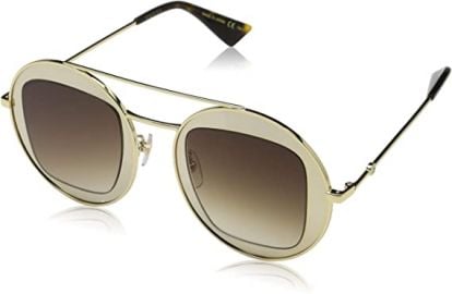 GG Round Sunglasses in Gold by Gucci at Amazon