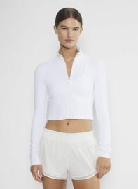 Golden at Aritzia BUTTER Limit Zip Longsleeve in White at Aritzia