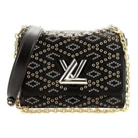 Grommet Embellished Twist Handbag Limited Edition by Louis Vuitton at 1st Dibs