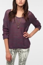 Haley's purple knit sweater on Modern Family at Urban Outfitters