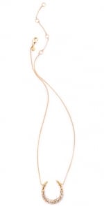 Hanna's gold horseshoe necklace at Shopbop