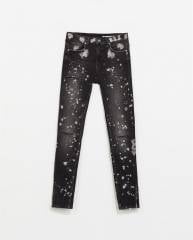 Jeans with painted spots and rips at Zara