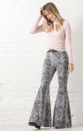 Just Float On Printed Flare Jeans by Free People at South Moon Under