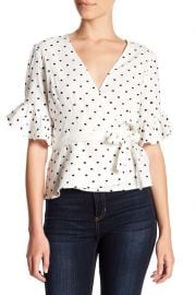 WornOnTV: Morgan’s white polka dot top with ruffled sleeves on E! News ...