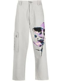 Kidsuper Face embroidered straight leg jeans at Farfetch