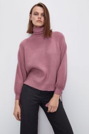 Knit sweater with tied cuffs at Zara